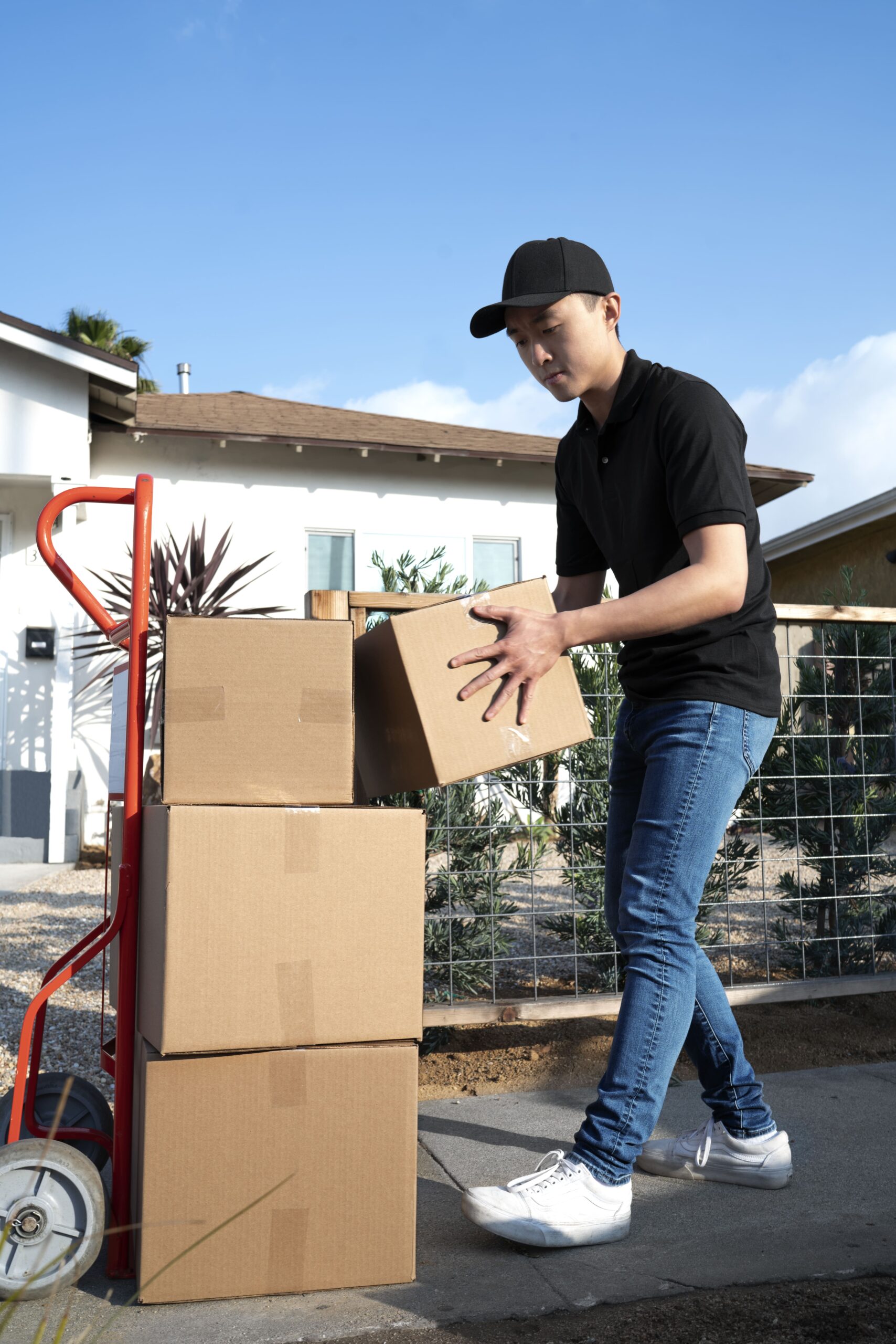 delivery-person-getting-parcel-out-delivery (1)